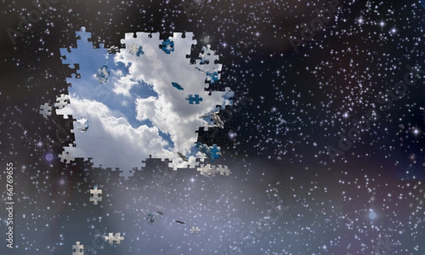 Fototapeta Puzzle pieces fall from night sky revealing day