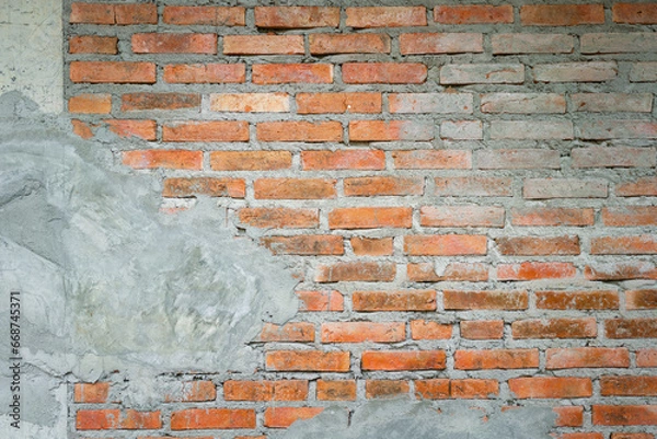 Fototapeta Brickwall with cement structure of the builiding house. Background and texture photo.