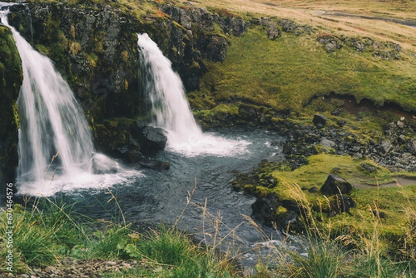 Fototapeta Beautifull arrowhead mountain Kirkjufell and waterfall on Snaefellsnes peninsula, Iceland