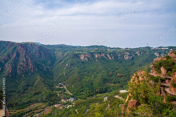 Fototapeta Mountains and forests under the sky