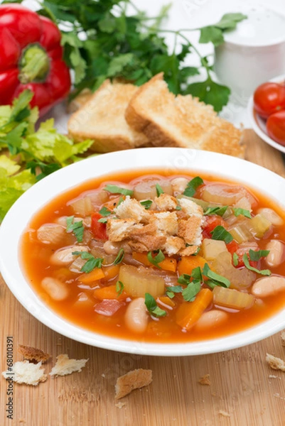 Fototapeta vegetable minestrone with croutons, vertical