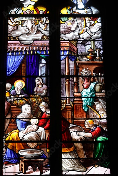 Fototapeta Sainte Croix (Holy Cross) church, Bernay, Eure, France. Stained glass. Jesus as a baby.