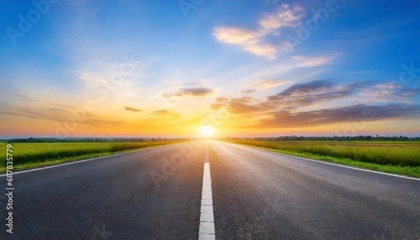 Fototapeta Road to Twilight: Empty Asphalt Path under a Painted Sky