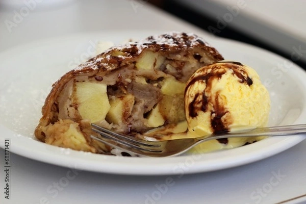 Fototapeta Apple strudel with whipped cream and vanilla ice cream