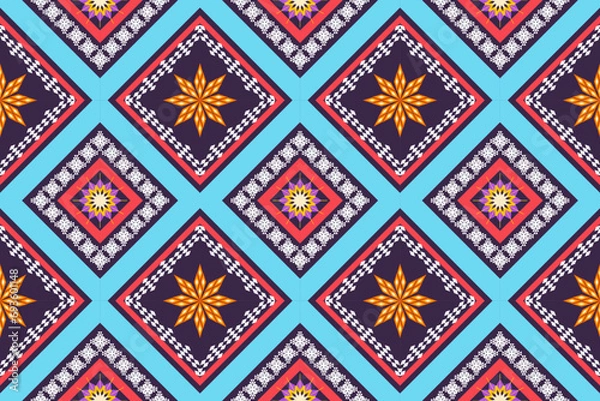 Fototapeta Ikat ethnic aztec embroidery style.Figure Geometric oriental traditional art pattern.Design for ikat background,wallpaper,fashion,clothing,wrapping,fabric,element,sarong,graphic,vector illustration.