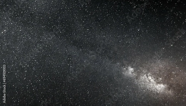 Fototapeta a dark interstellar space serves as the perfect backdrop for a starry night sky