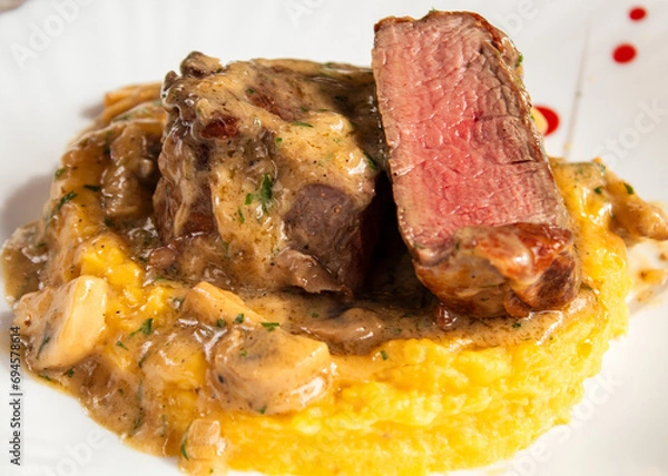 Fototapeta Filet mignon with mushrooms and mashed potatoes, dinner full of flavor