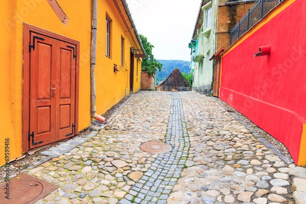 Fototapeta Medieval street view in Sighisoara founded by saxon colonists in