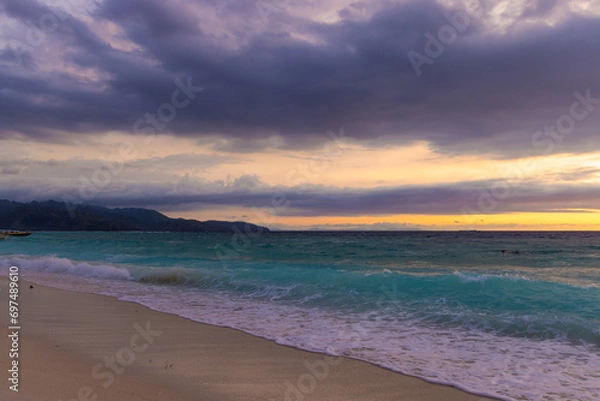 Fototapeta Sunset on the beach with clouds, Gili Meno, Indonesia