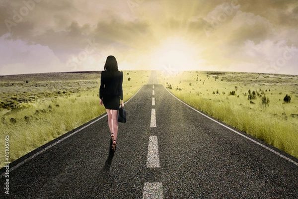 Fototapeta Businesswoman standing on the highway road 2