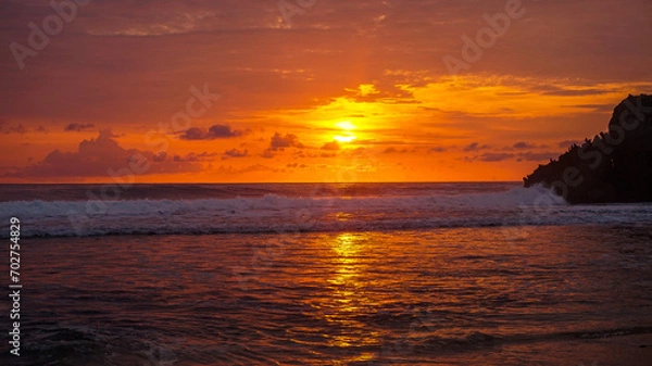 Fototapeta Beautiful sunset at Kukup Beach in Central Java, Indonesia