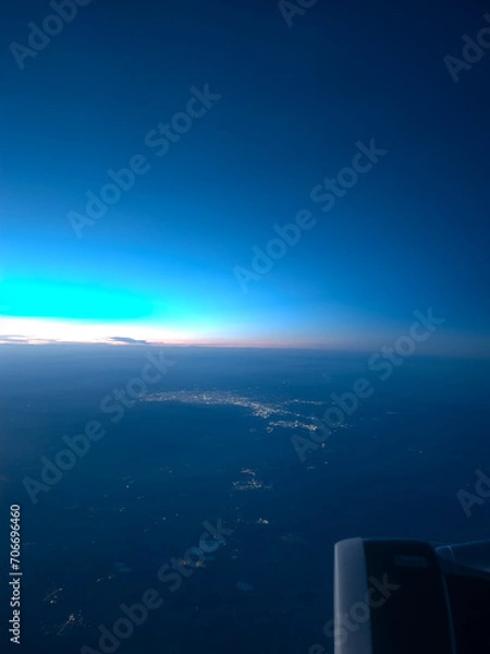 Fototapeta Image of a beautiful sunset taken from an airplane.