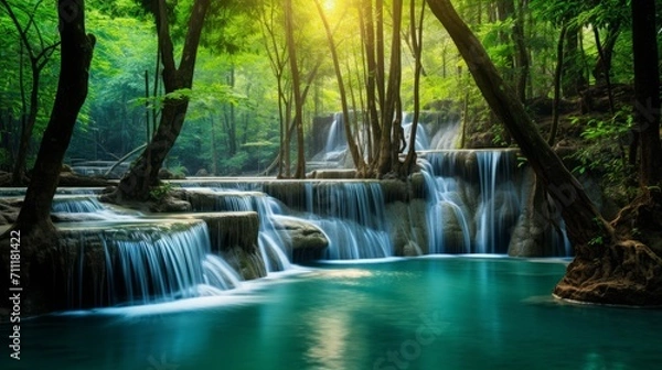 Fototapeta Enchanting Waterfall in Lush Tropical Forest