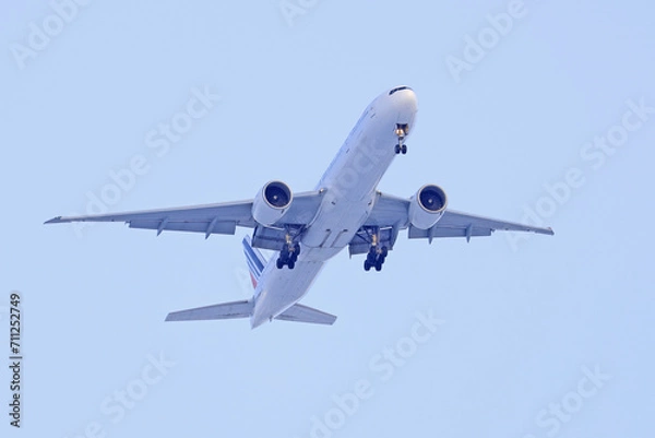 Fototapeta Plane flying to destination, Montreal, Canada