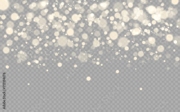 Fototapeta Dust sparks and stars shine with a special light. Christmas light effect. Glittering particles of magic dust.Vector sparkles on a transparent background.