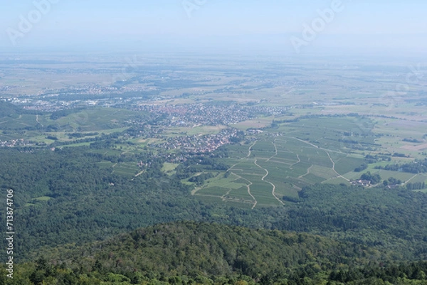 Fototapeta Various fields, wide lands, and valleys. With interesting colors, lines, and textures. Shot in France.