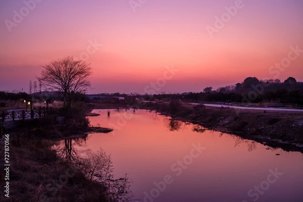 Fototapeta sunset on the river