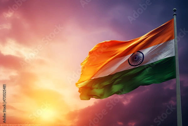 Fototapeta The national flag of India flutters against the background of dawn, the flag of India against the sky, Independence Day, Republic Day