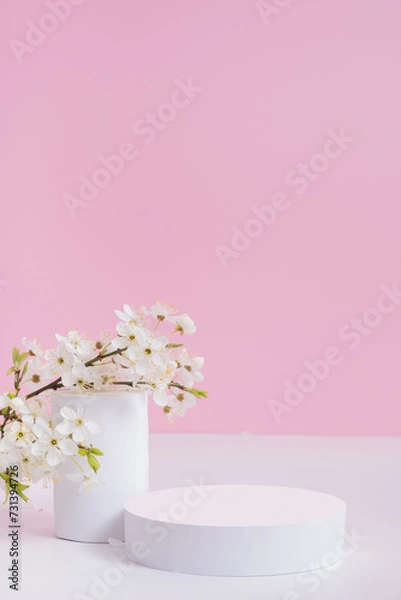 Fototapeta Empty podium or pedestal with spring bloom. Spring mock up for cosmetic products