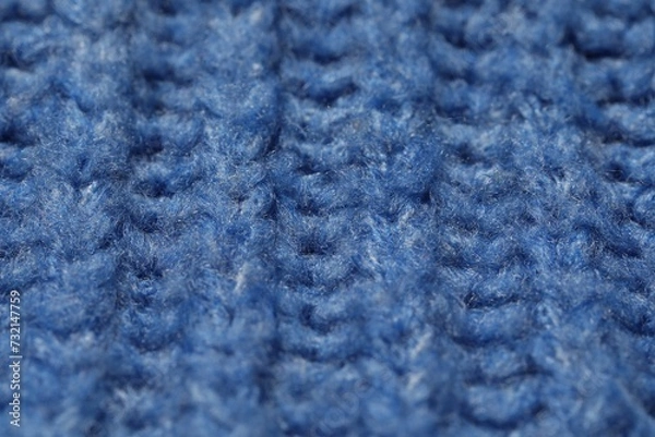 Fototapeta Texture of soft blue knitted fabric as background, closeup