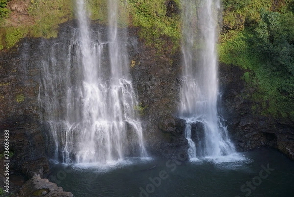 Fototapeta A beautiful waterfall in the midst of perfect nature in the forest.