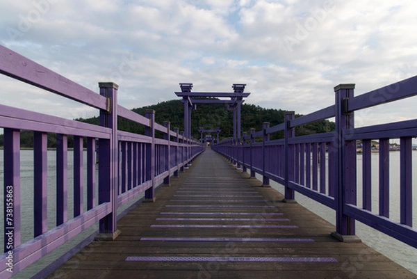 Fototapeta View of the bridge at the seaside during sunset