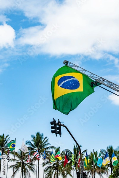 Fototapeta Brazil Flag Haning inn Blue skies on Sunny Day in Santos Sao Paolo Brazil