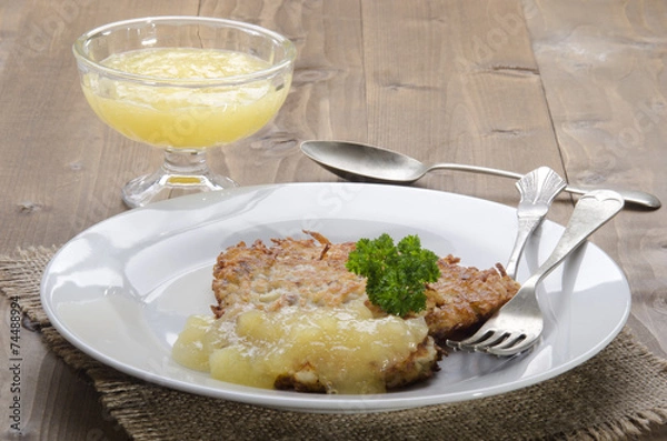 Fototapeta potato pancake with bramley apple sauce