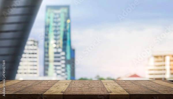 Fototapeta Table Top And Blur Building Of Background; for montage product display or