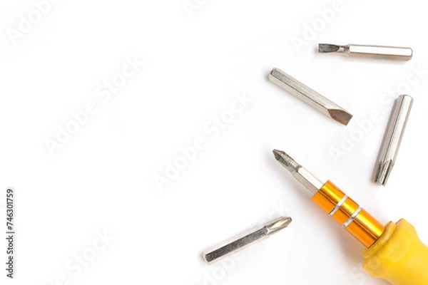 Fototapeta screwdriver and Set of heads for screwdriver (bits) on a white background. top view, copy space