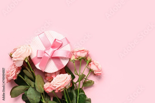 Fototapeta Gift box with bouquet of roses on pink background. Valentine's Day celebration