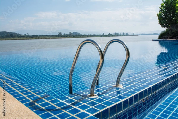 Fototapeta Swimming pool near Khong river with  blue sky  ,Chiangsan in Chi