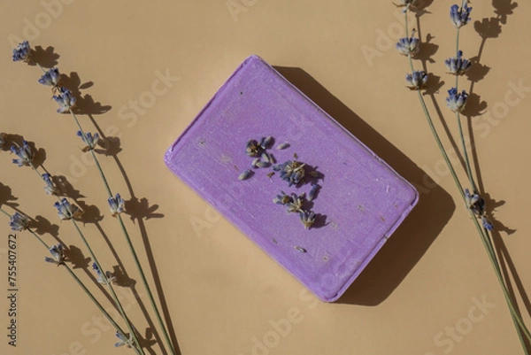 Obraz Lavender soap on beige background with copy space for your text. Advertisement template mock up. Skincare homemade natural cosmetic concept. Organic dry lavender flower