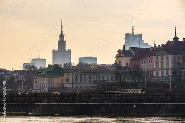 Fototapeta Warsaw, Poland - panorama of a city skyline and Old Town. Cityscape view of Warsaw. Skyscrapers in Warsaw. Sunny day over the river	