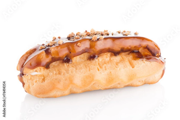 Fototapeta Eclair with caramel decoration