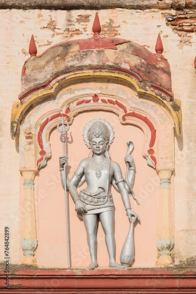 Fototapeta Sculpture of Dwarapal at the entrance of the Devdeveshwar temple on the Parvati Hill at Pune, Maharashtra, India, Asia.