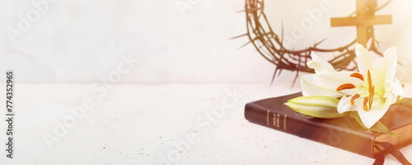 Fototapeta Bible, lilies, cross and crown of thorns on light background with space for text