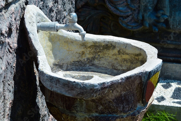 Fototapeta Close-Up Side View Of Artistic Concrete Outdoor Sink Building In The Garden