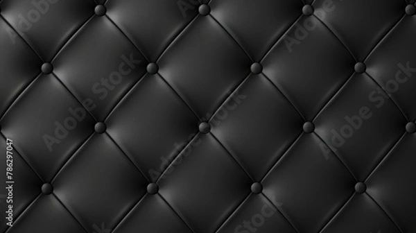 Fototapeta Close up of a black leather couch with button detailing