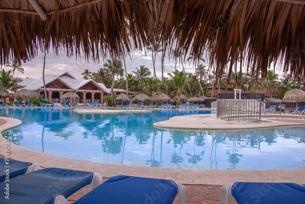 Fototapeta Pretty swimming pool in a large hotel in Punta Cana in the Dominican Republic