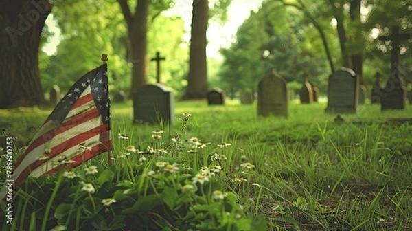 Fototapeta Cemetery in a green meadow with an american flag on each gravestone for the celebration of memorial day 