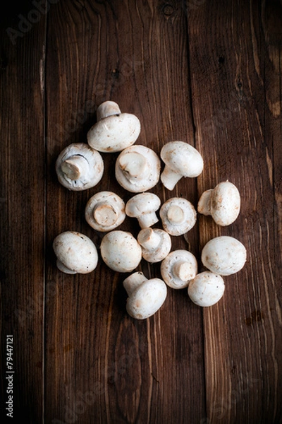 Fototapeta White mushrooms on wood table