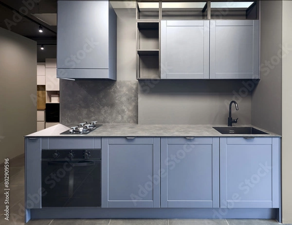 Fototapeta Blue gray contemporary kitchen linearlayout with hood, two burners gas cooker hob oven and built in dishwasher machine, square black sink and tap. Compact high pressure laminate HPL countertop