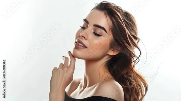 Fototapeta Beautiful portrait of a female model facing the camera with a smile full of happiness, radiating alluring cheerfulness.