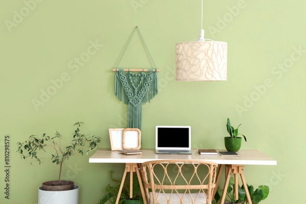 Fototapeta Interior of office with workplace and green houseplants