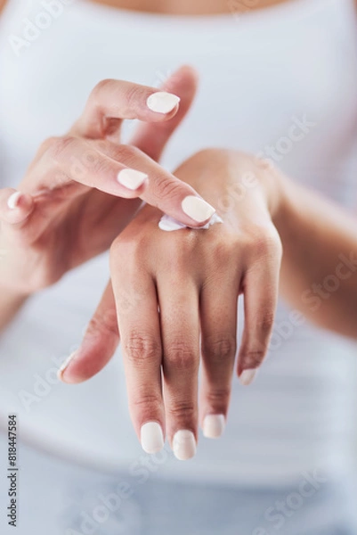 Fototapeta Home, hands and woman with cream, skincare and beauty with moisturizer, grooming routine and treatment. Closeup, apartment and person in bathroom, manicure and apply lotion with healthy dermatology