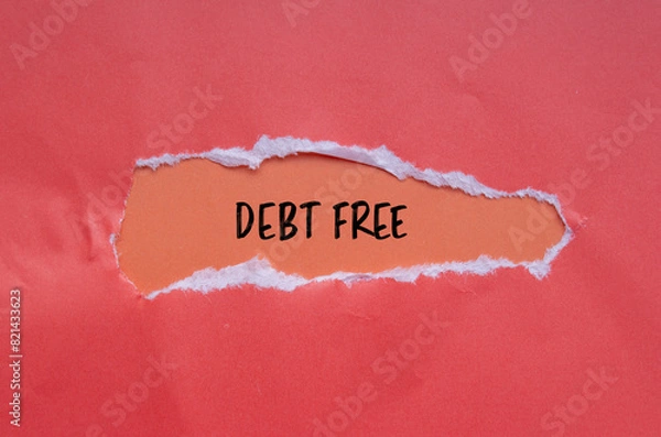 Fototapeta Debt free words written on torn paper with orange background. Conceptual debt free symbol. Copy space.