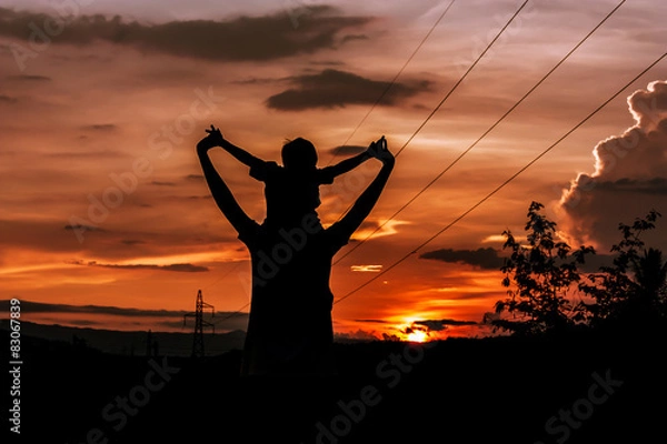 Fototapeta silhouette of mother playing with her son