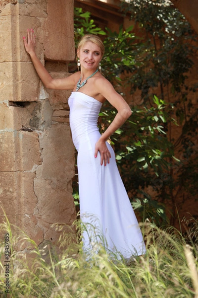 Fototapeta Woman in white dress