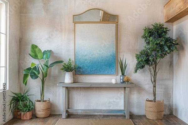 Fototapeta A serene and elegant entryway with a minimalist design, featuring a console table with a stylish mirror above it, a statement piece of art, and potted plants to add a touch of nature